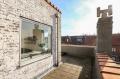 Breda, Magnoliastraat 26, 26a en Eikstraat 1