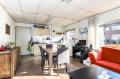 Breda, Magnoliastraat 26, 26a en Eikstraat 1