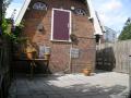Dakterras / ingang bovenwoning