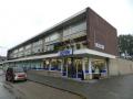 Action tegenover belegging