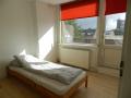Slaapkamer achterzijde met balkon